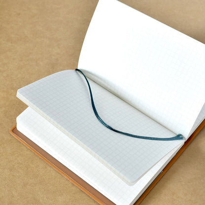 Pocket Log Notebook designed by Tobimatsu Shoichiro - A Cat Plush Found at a Flea Market